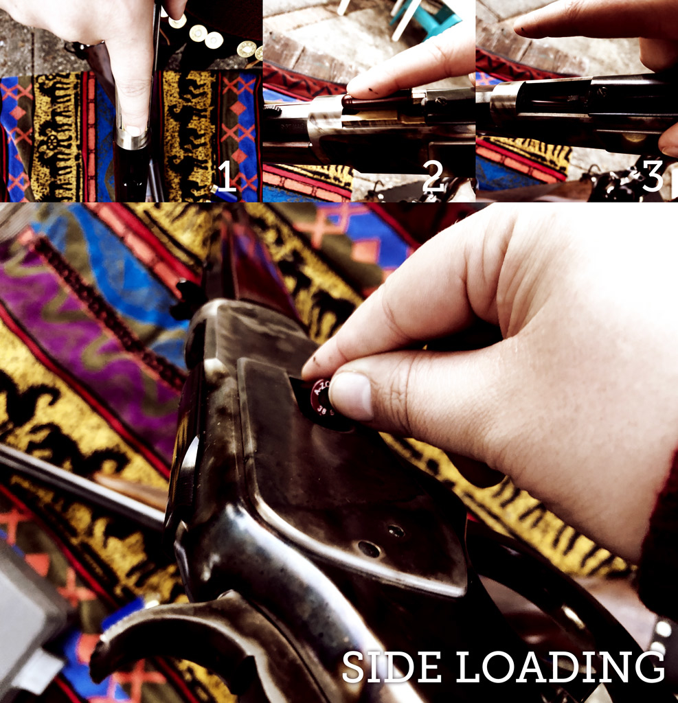 cowboy action shooter loading a rifle a photo of a cowboy action shooter loading a rifle