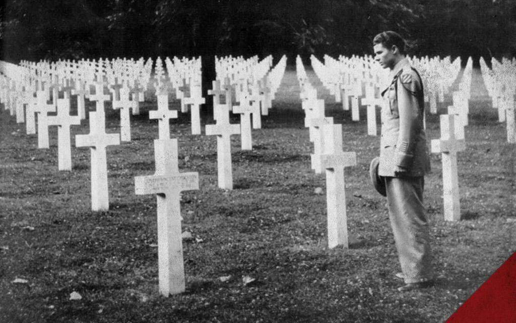 Audie Murphy viewing graves after WWII in France a photo of Audie Murphy viewing graves after WWII in France