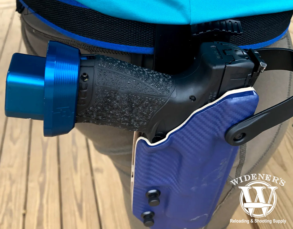 walther ppq pistol in a holster with magazine extension a photo of a walther ppq pistol in a holster with magazine extension