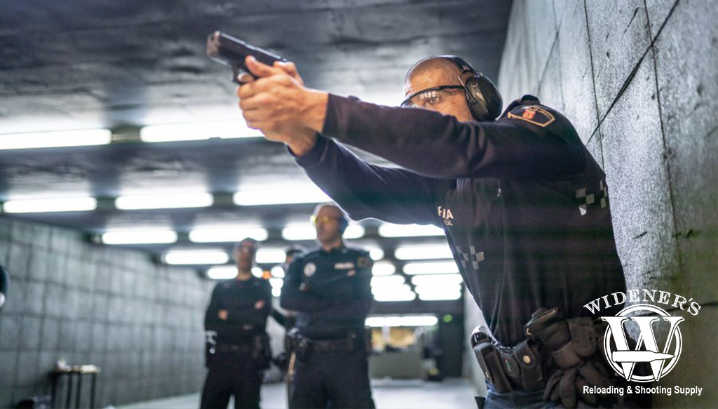 an officer participating in police firearm training a photo of an officer participating in police firearm training