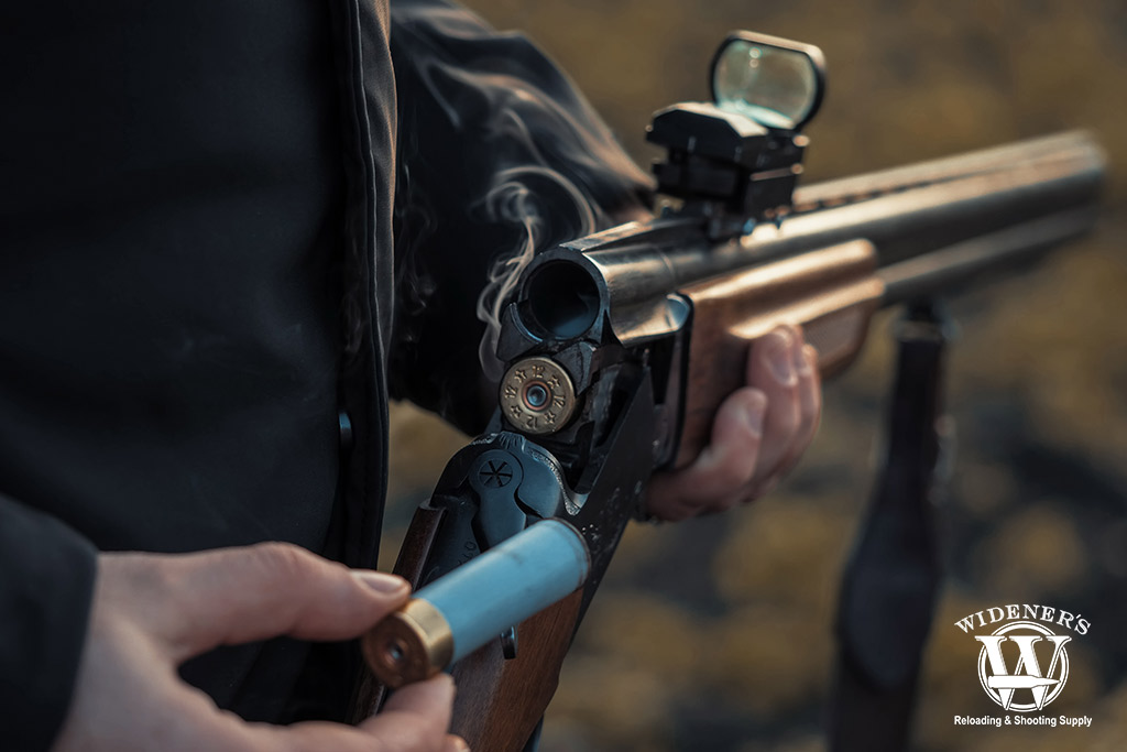 reflex sight mounted on a shotgun a photo of a reflex sight mounted on a shotgun