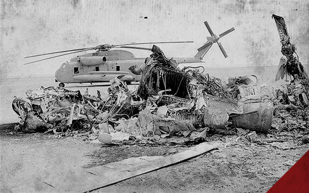helicopter wreckage from the failed Operation Eagle Claw a photo of helicopter wreckage from the failed Operation Eagle Claw