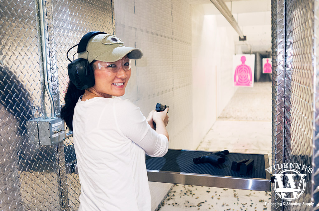 female at a shooting range a photo of a female at a shooting range