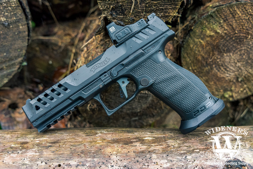 a photo of a walther handgun with a pistol red dot