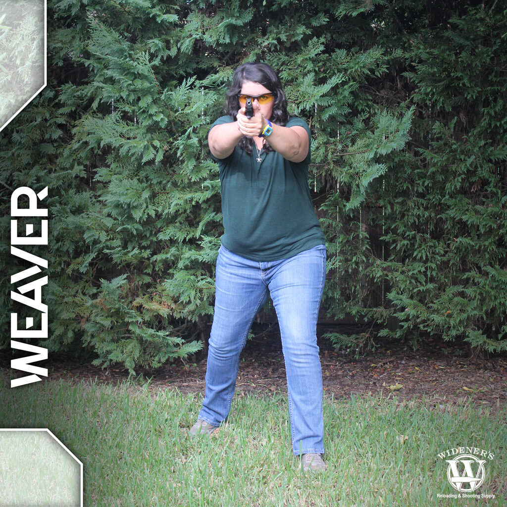 weaver pistol shooting stances a photo of a female instructor demonstrating weaver pistol shooting stances