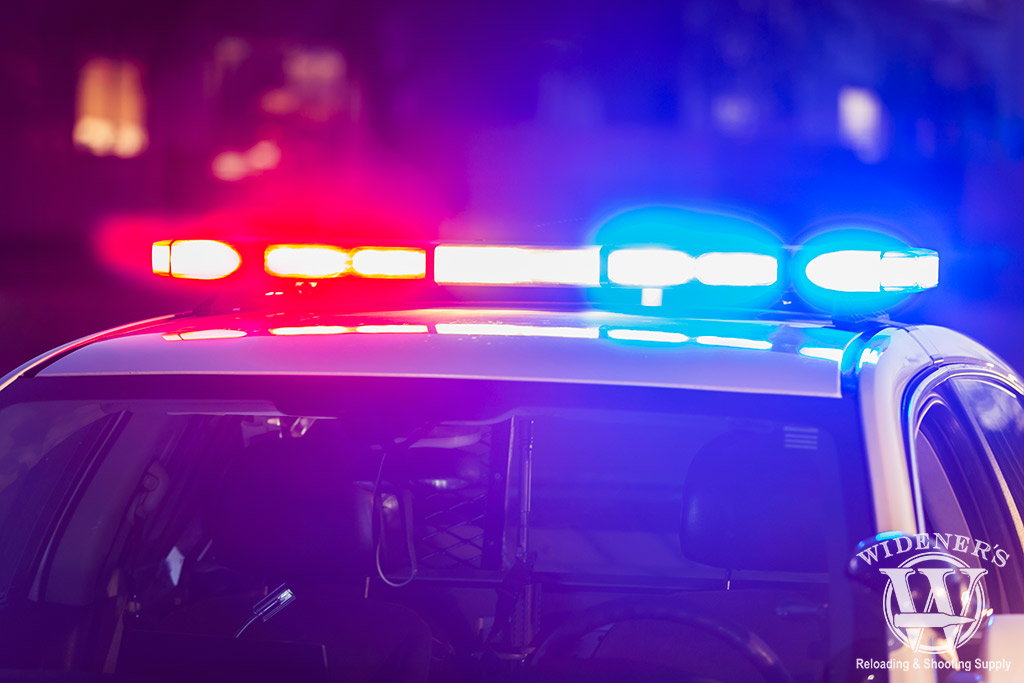 photo of a police car on patrol photo of a police car on patrol