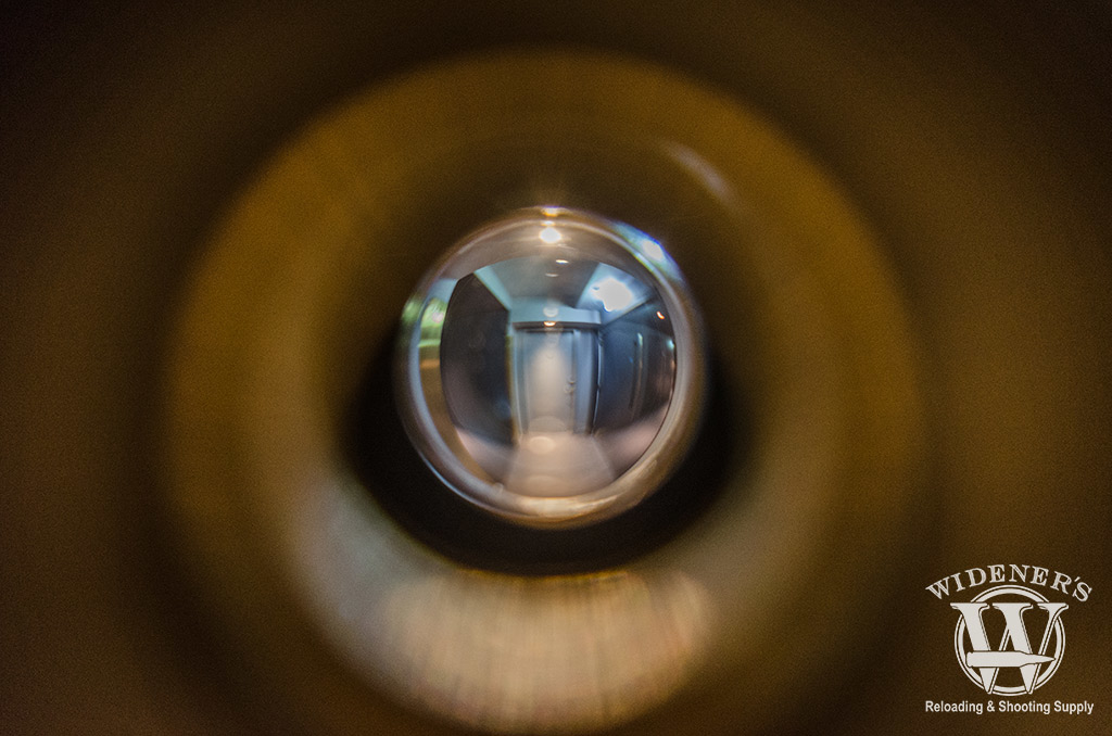 looking through a peephole at an apartment complex photo pov looking through a peephole at an apartment complex